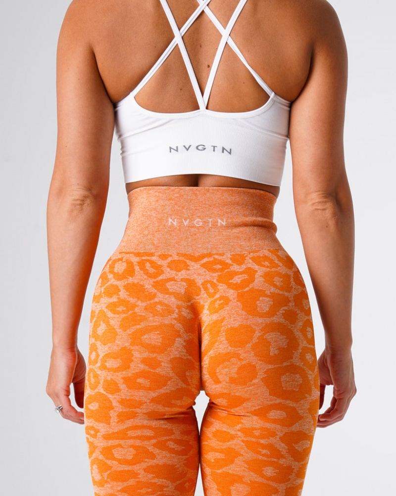 Women's NVGTN Snakeskin Seamless Leggings Orange | MXWT-64810